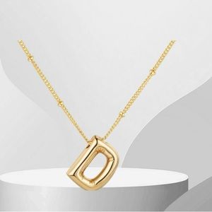Bubble initial shaped necklace